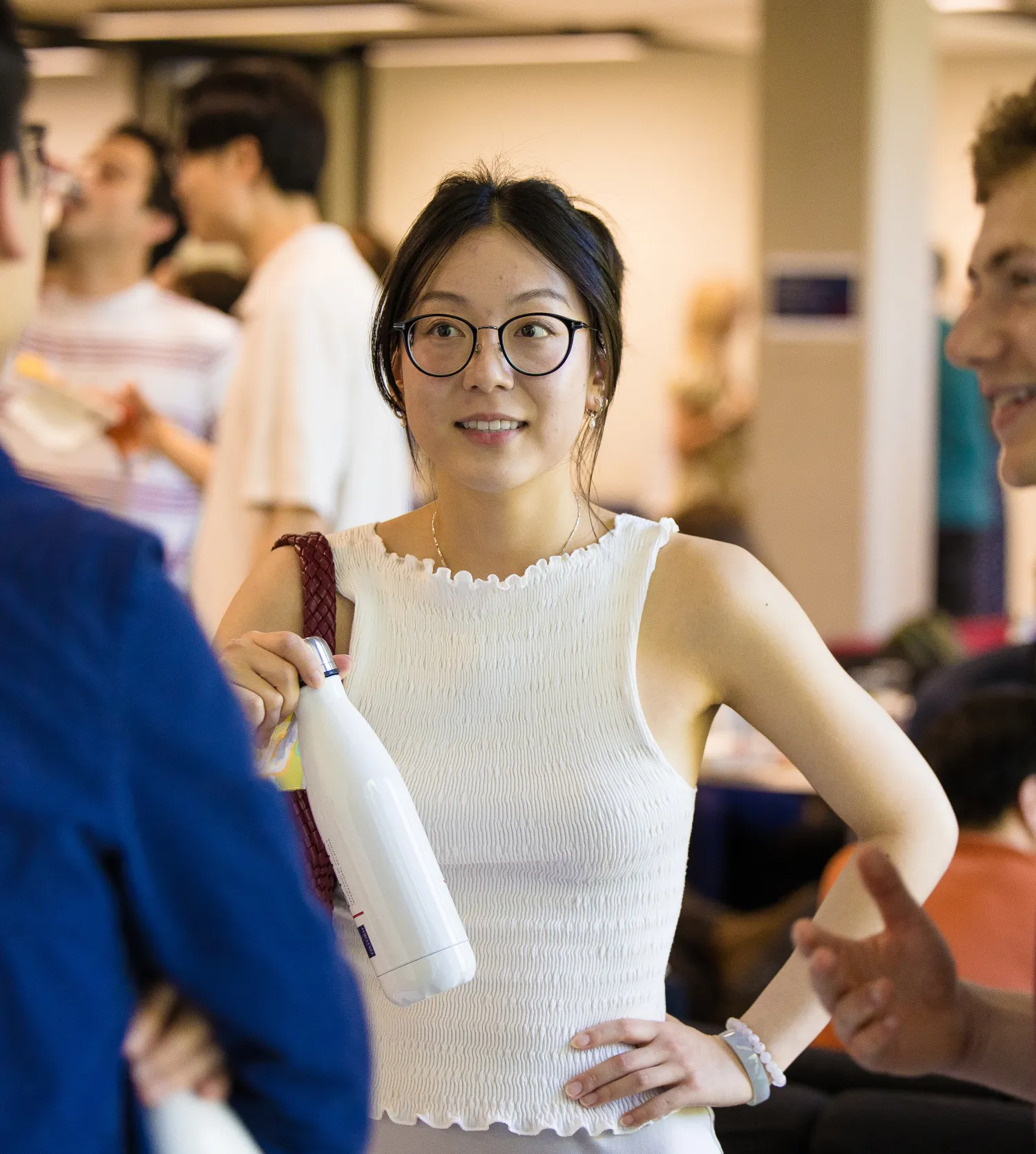 image of a group of students standing talking