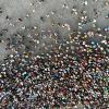 Aerial. Hundreds of people. Crowd of people top view from drone.