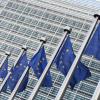 European Union flags in the wind outside the European Commission