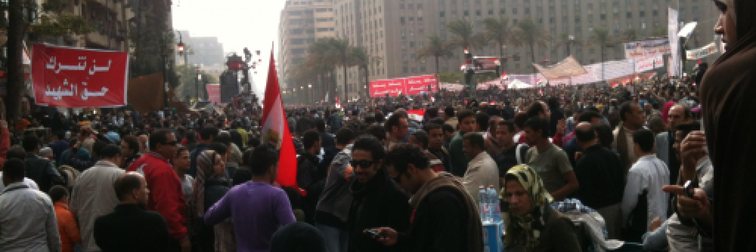 Image of a crowd of people in a city in Egypt