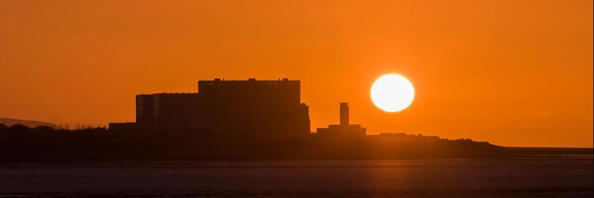 Nuclear power station at sunset