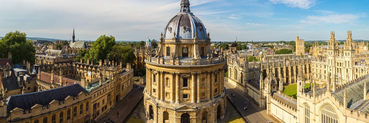 aerial image of the Radcliffe Camera in Oxford, with a  blue sky in the background