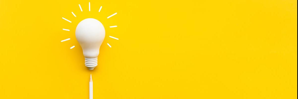 Image of a white lightbulb against a yellow background