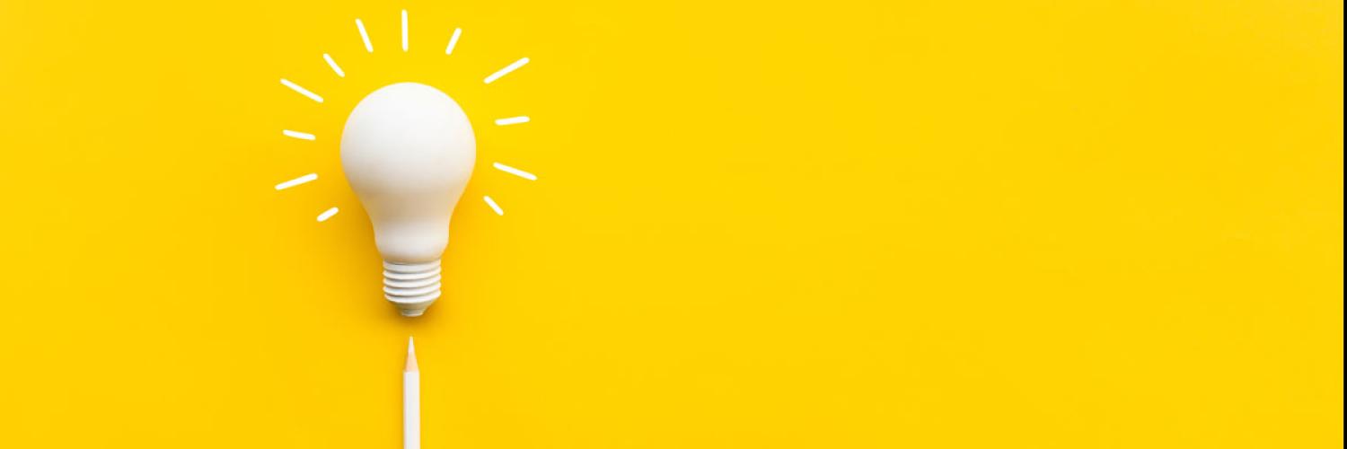 Image of a white lightbulb against a yellow background