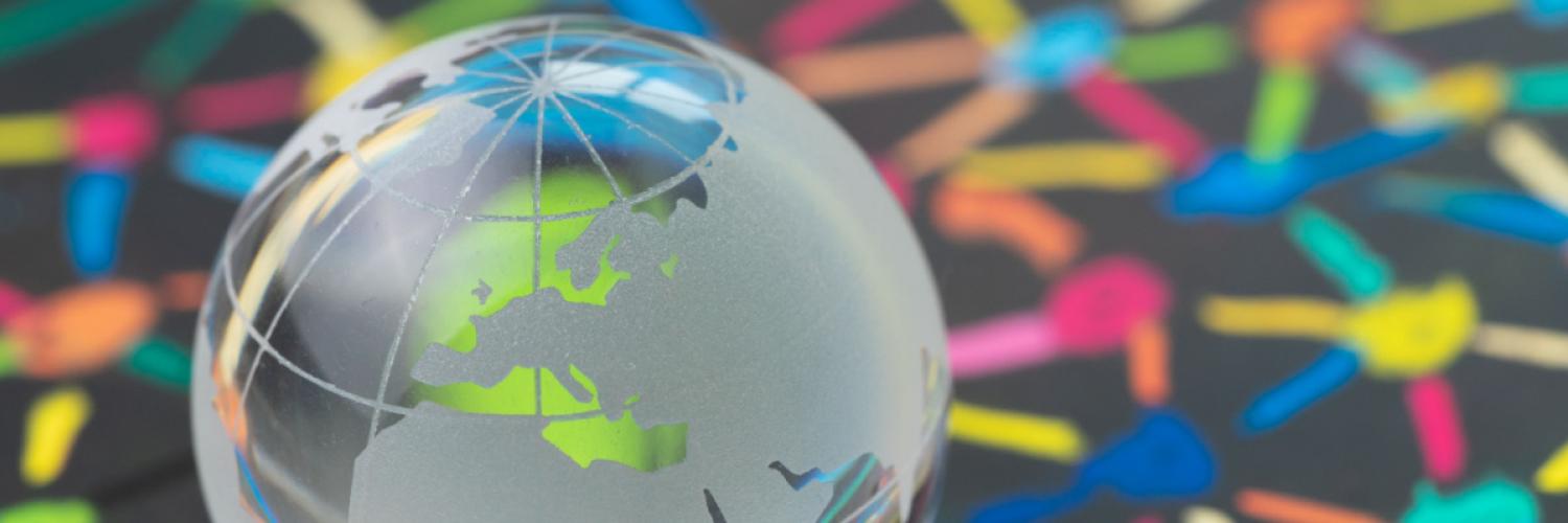 Glass globe on patterned background