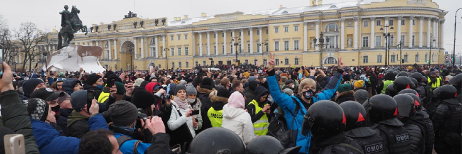 a group of people in riot gear