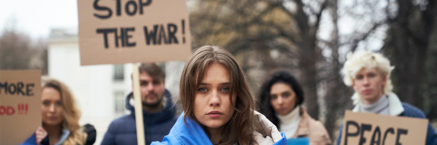 A group of people holding signs