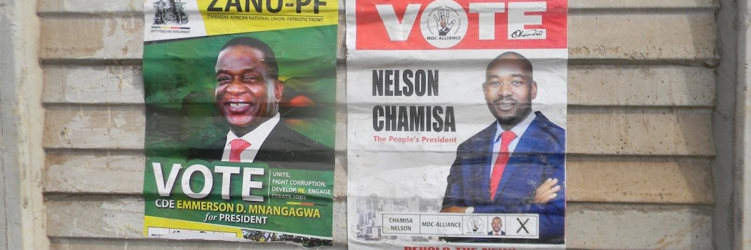 a close-up of posters on a wall