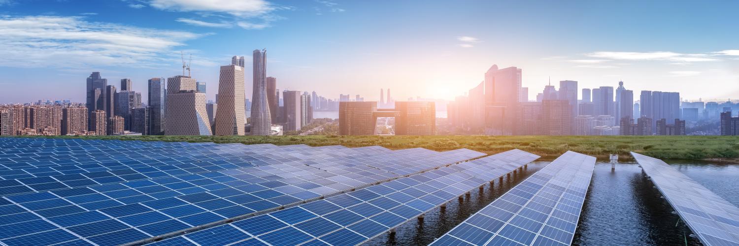 City skyline with solar panels in the foreground