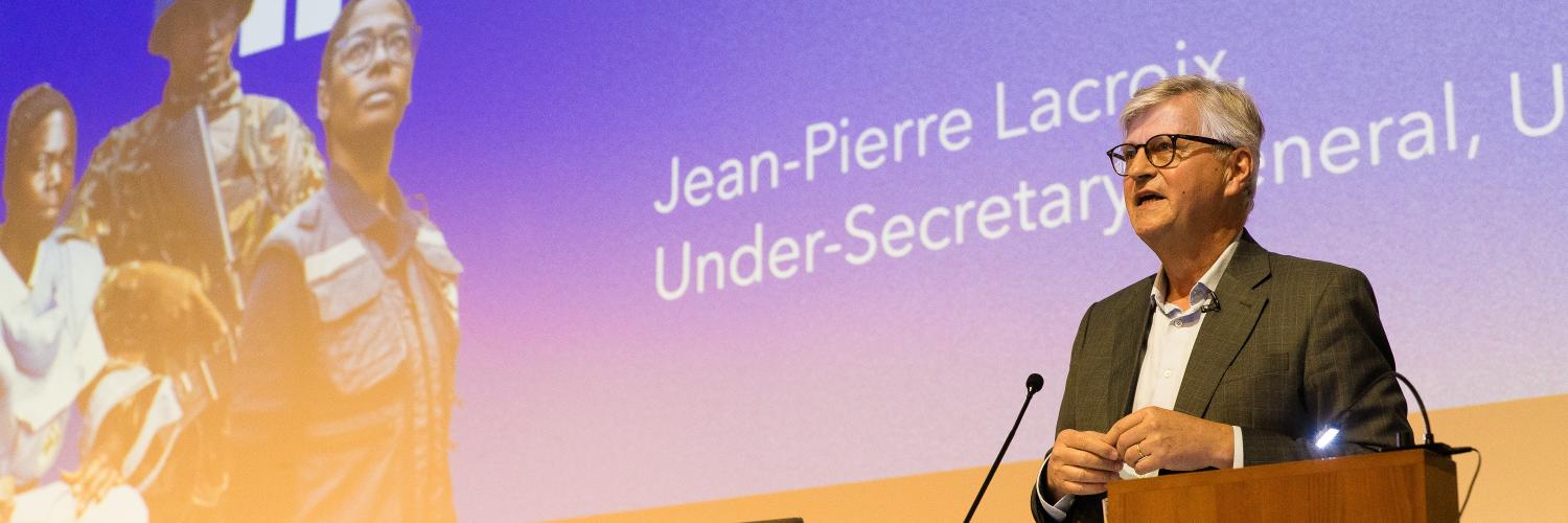 Jean-Pierre Lacroix delivering a lecture