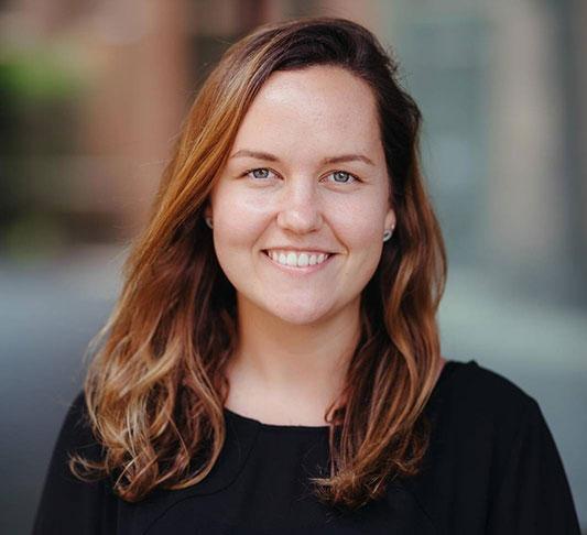 Image of a woman smiling at the camera