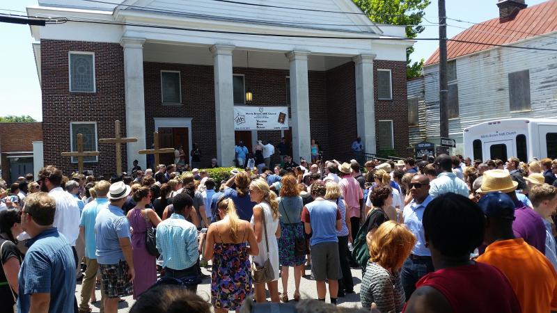 A crowd of people stood outside of the Charleston church shooting memorial service.