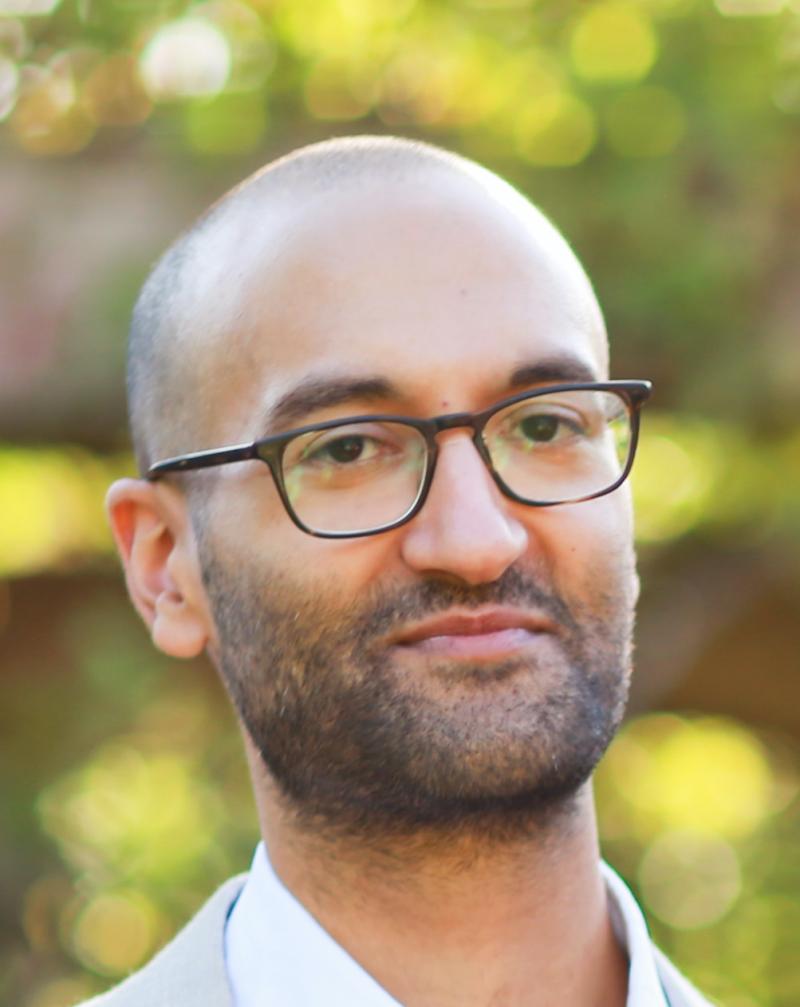 image of a bearded man wearing glasses