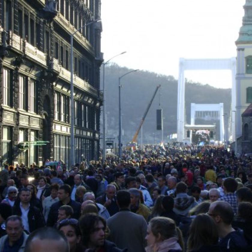 A crowd of people in a cityscape