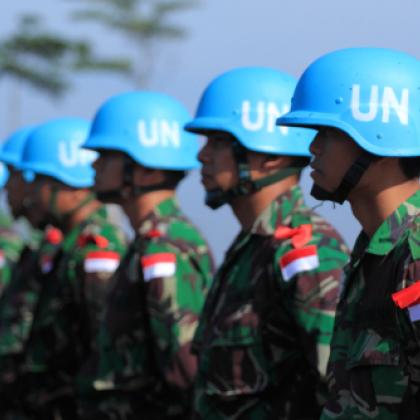 Five UN peacekeeping troops lined up together