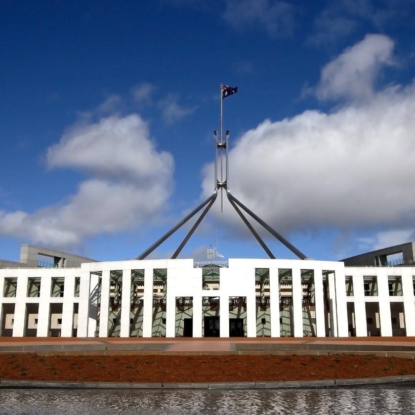 Image of a building with water in front of it