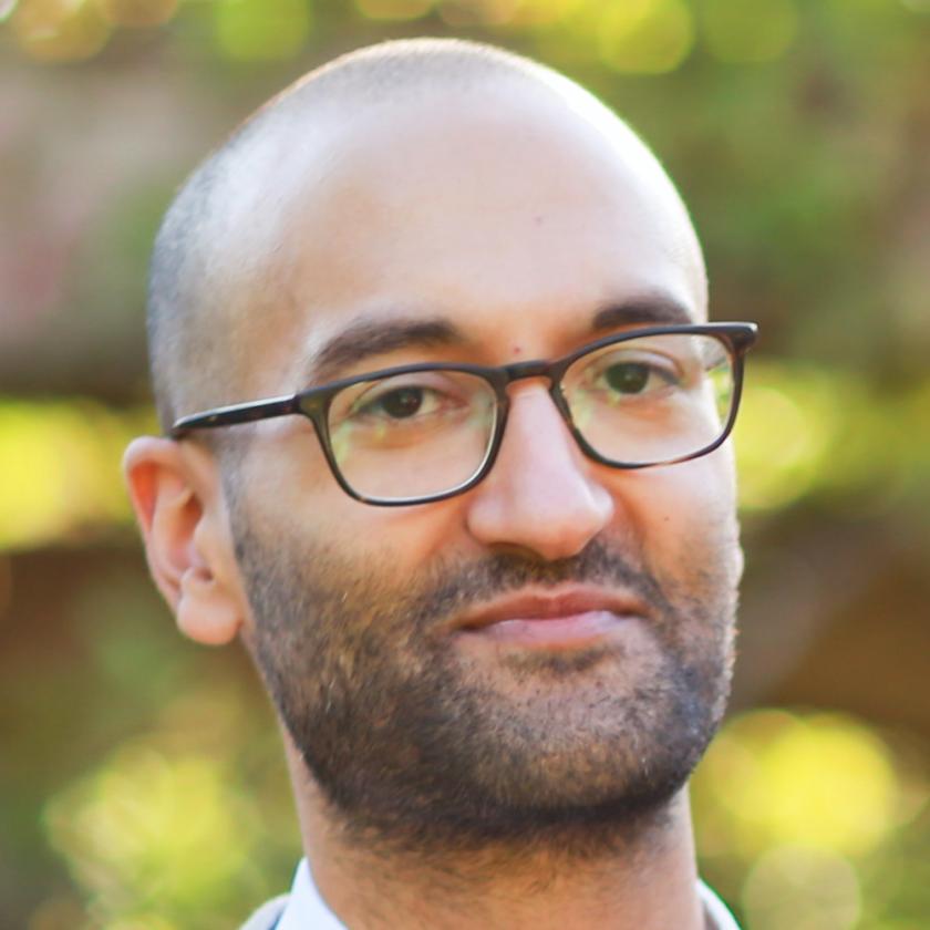 image of a bearded man wearing glasses
