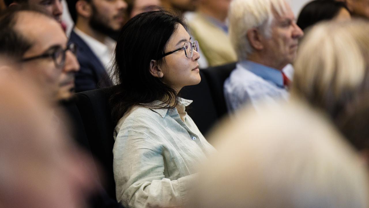 close up image of people in a seated audience