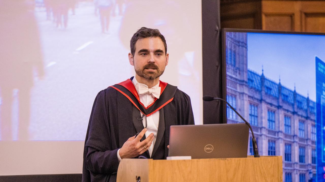 image of a man at a lecturn