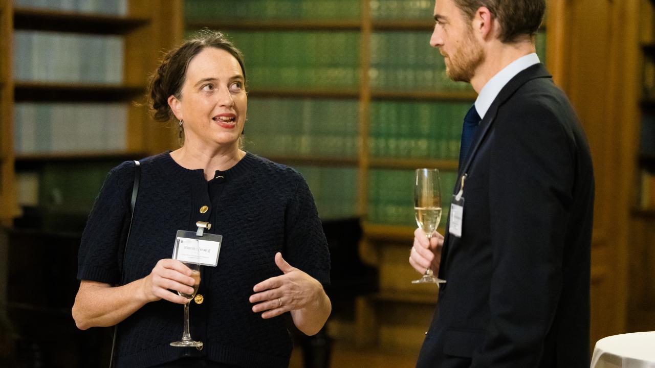 image of a man and a woman stood talking