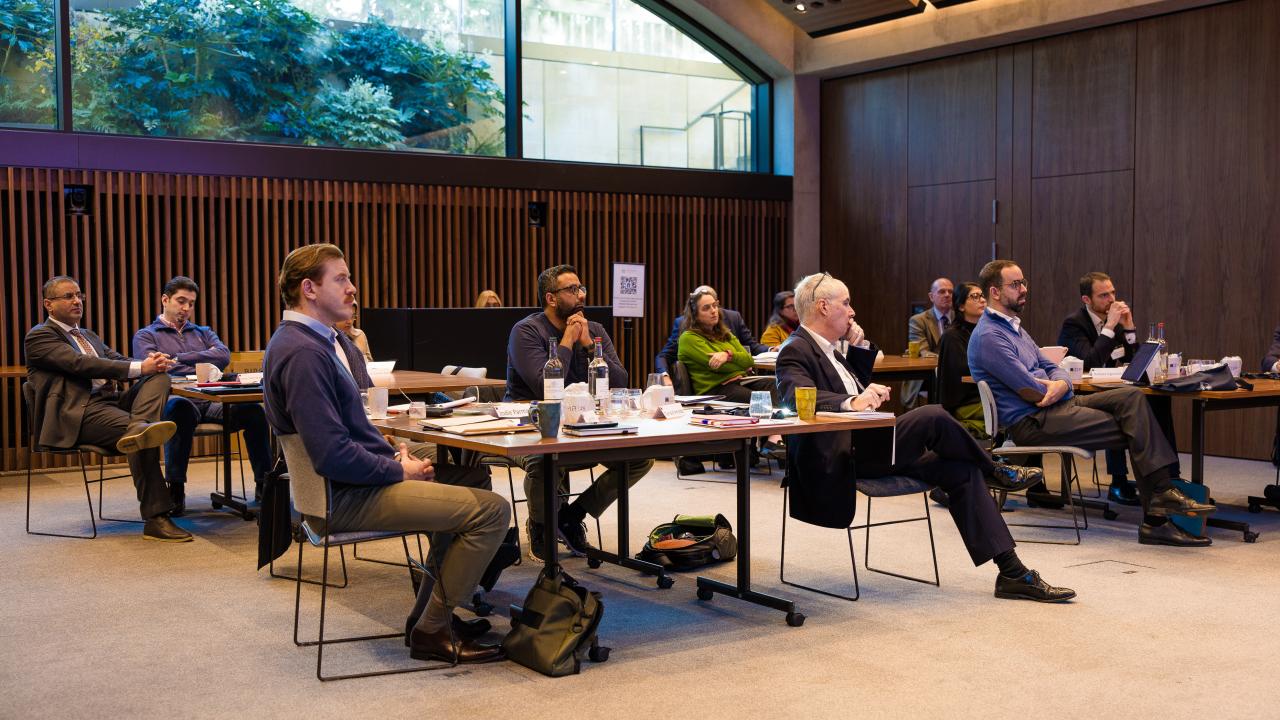 image of a seated audience in a room