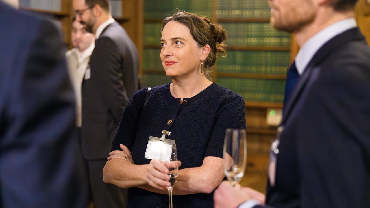 image of a group of people stood talking