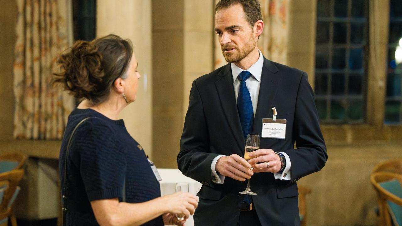 image of a man and a woman stood talking