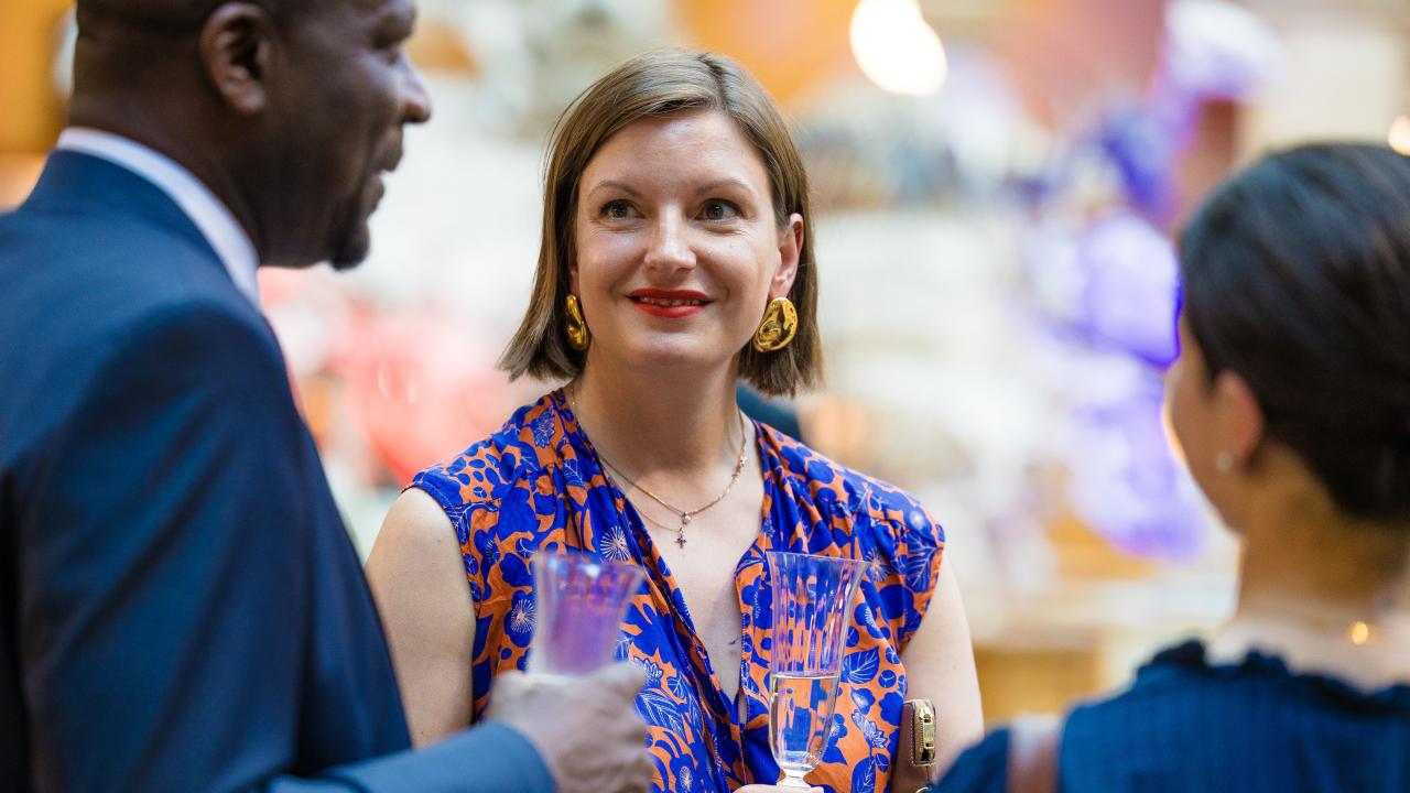 close up image of three people talking