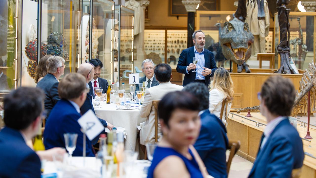 image of a group of people inside a building at an event