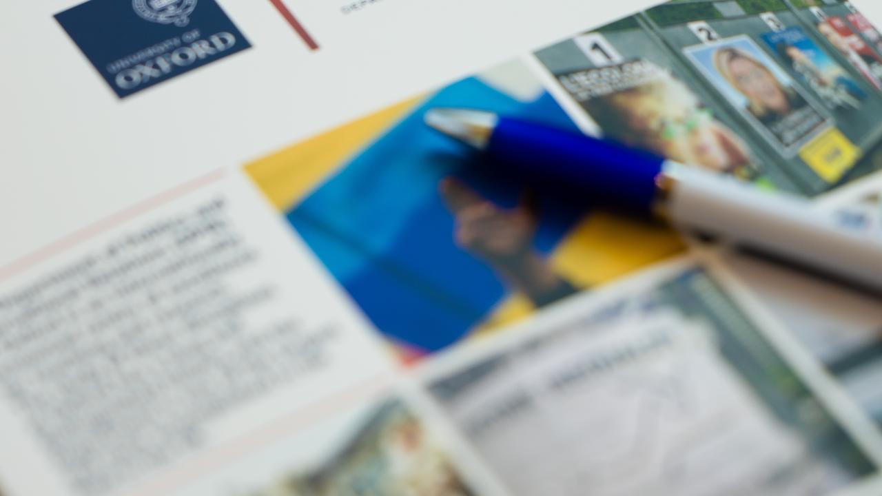 front cover of a magazine with 'DPIR' written on it and a pen on top of it