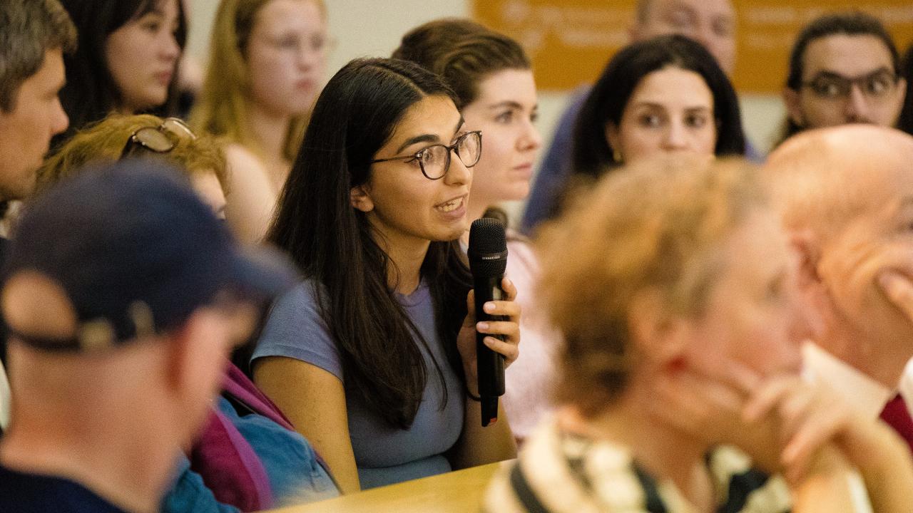 image of an audience listening to a lecture