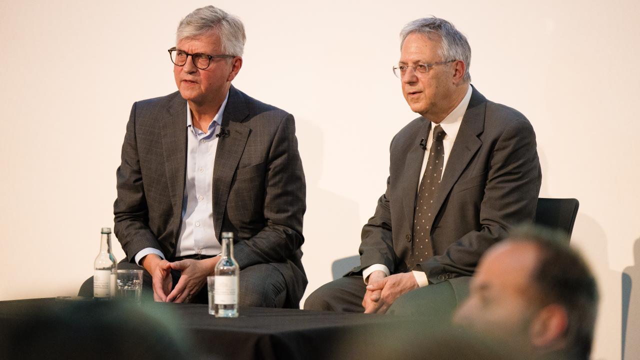 image of two people sat next to one another taking questions from an audience
