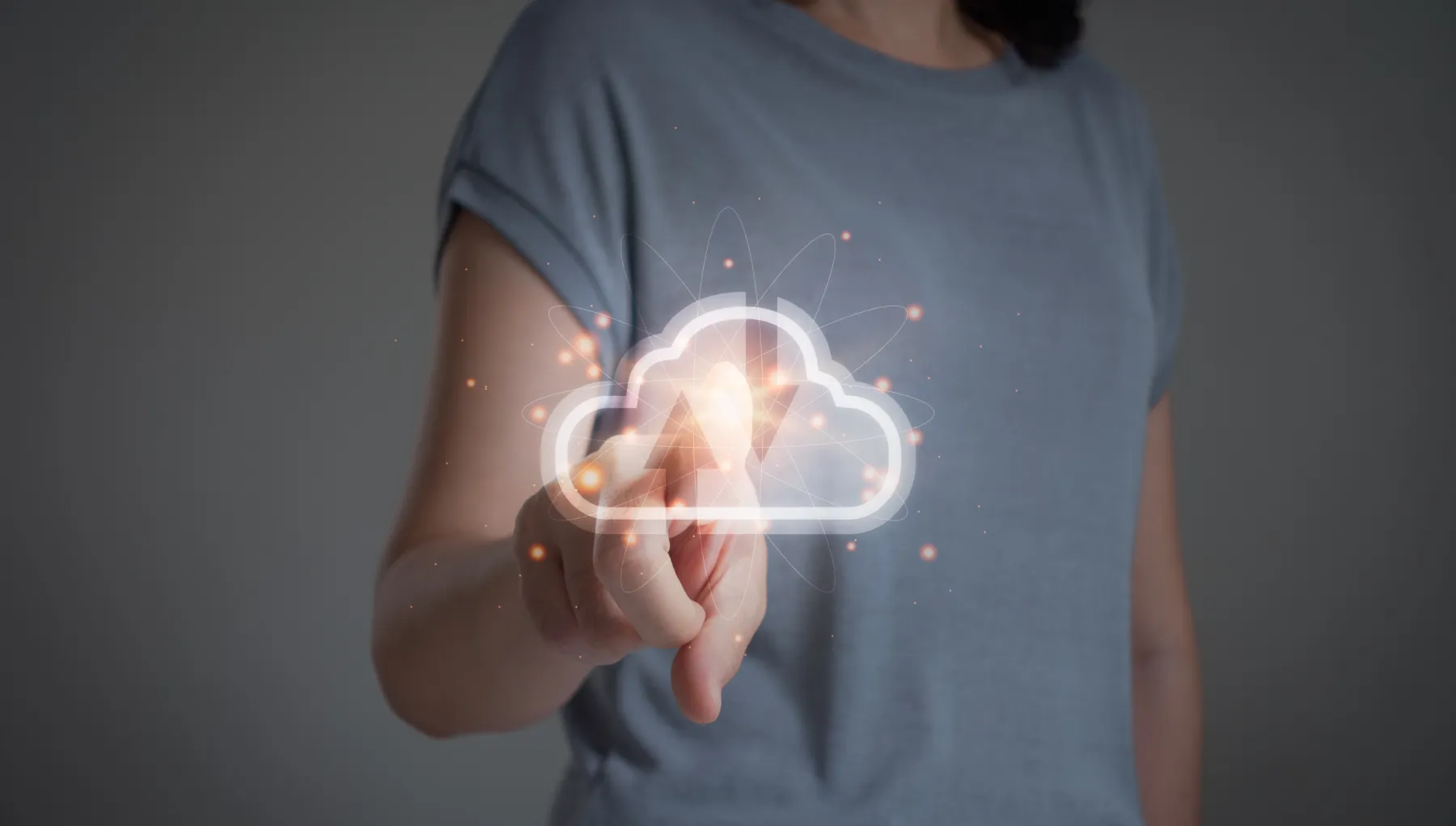 image of a cloud icon in front of an image of a person