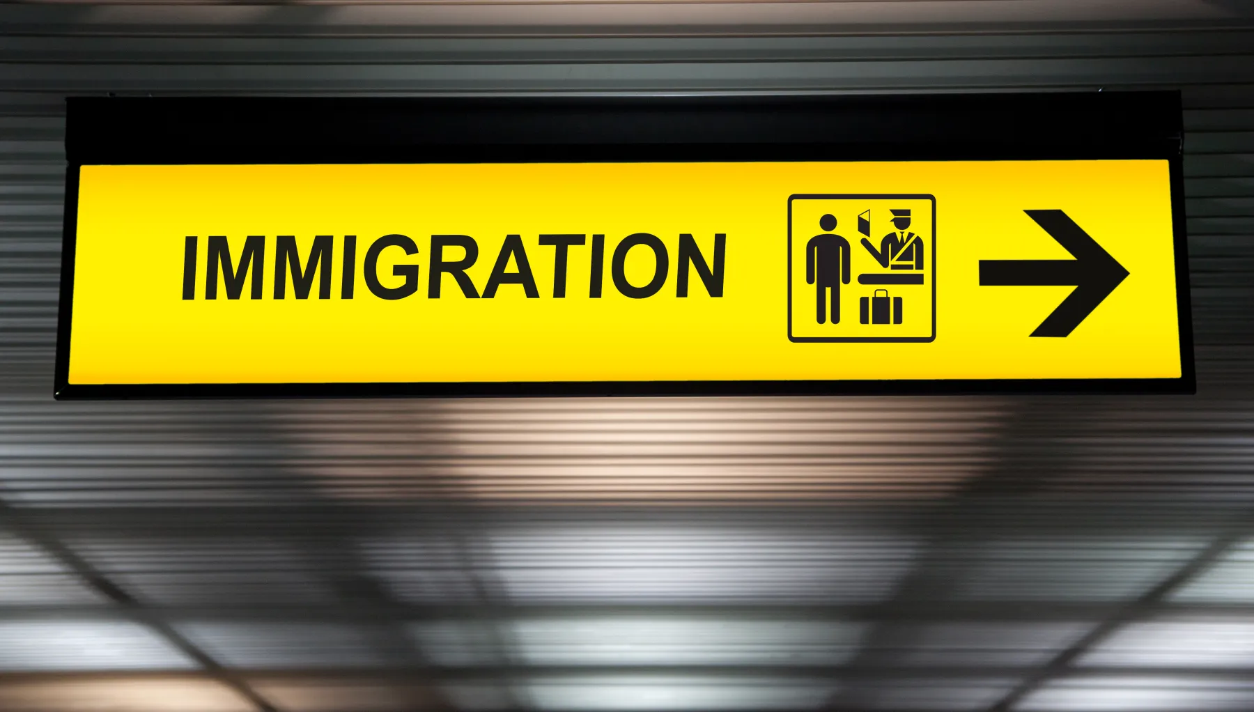 image of an immigration sign at an airport