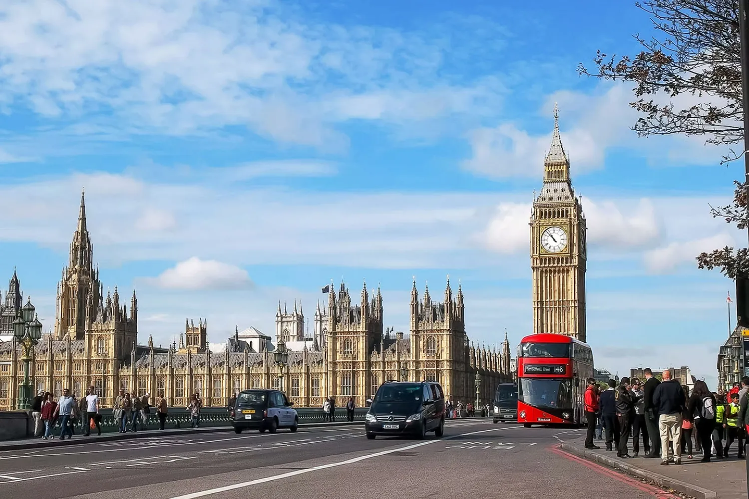 A double decker bus with Big Ben behind, London
