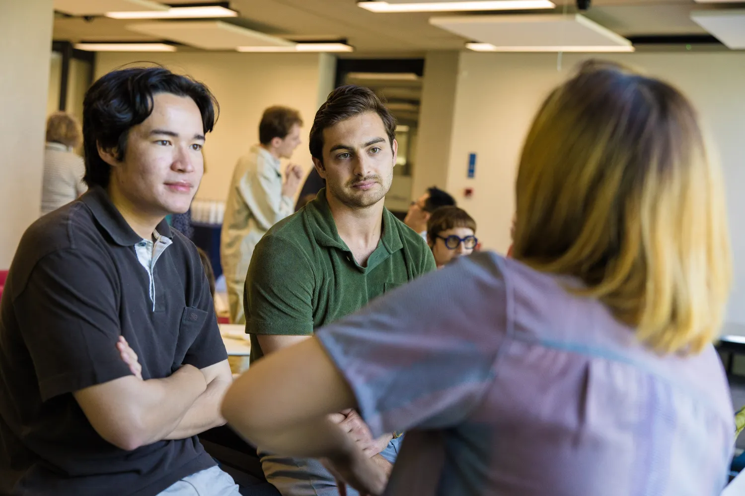 image of three students talking