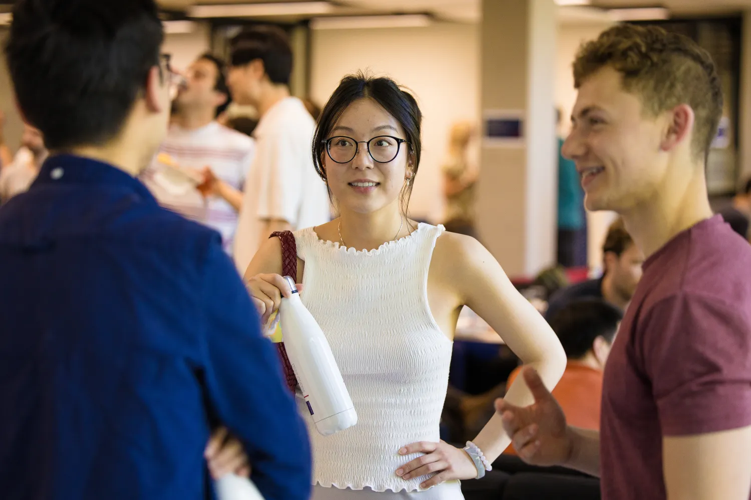 image of a group of students standing talking