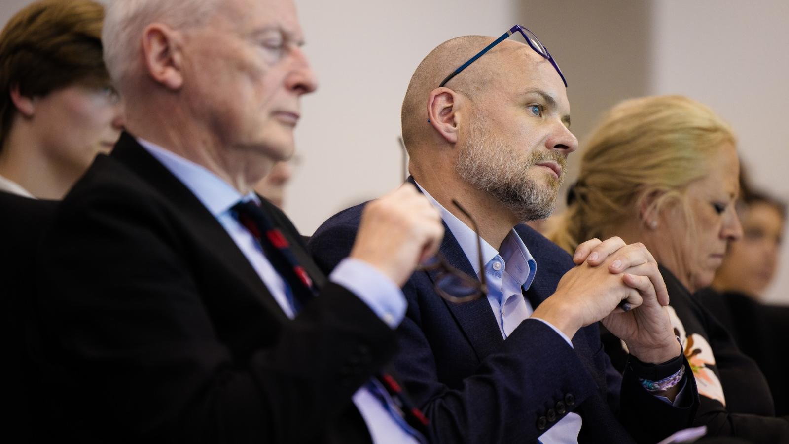 Dave Doyle listening at event